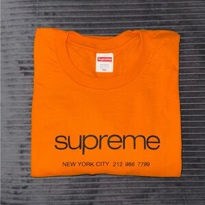 Supreme Shop Tee Shirt in Orange, short sleeve